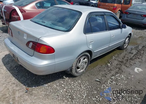 2000 Toyota Corolla Le from USA, damaged, VIN 2T1BR18E0YC357216